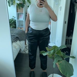 black faux leather trousers